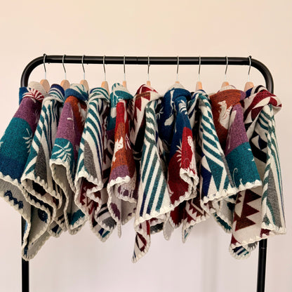 Rack showing different ponchos