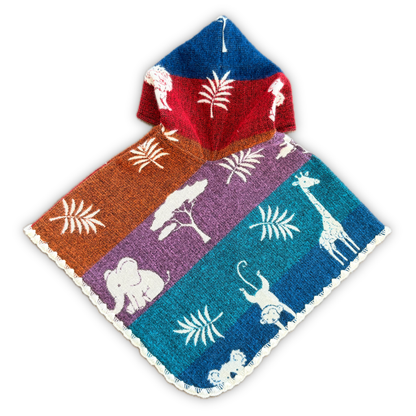 A knitted hooded baby poncho with a colorful safari animal and plant pattern, shown on a plain white background.