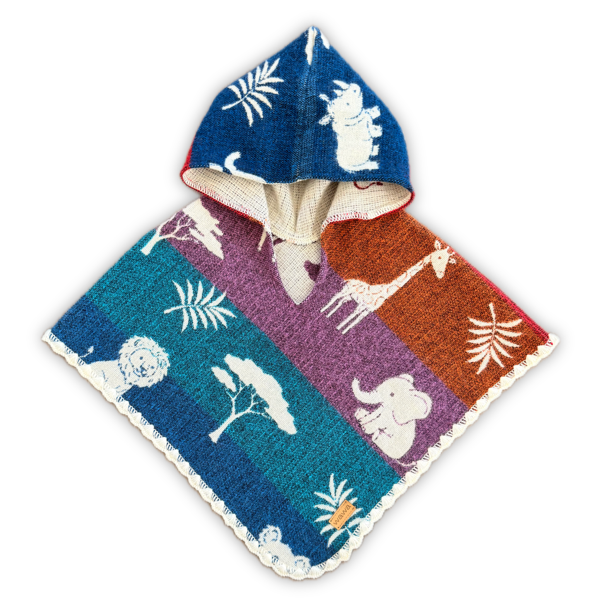 A hooded knit poncho with a colorful safari-themed print, featuring blue, purple, and orange stripes with white animal and plant motifs, finished with a cream-colored scalloped edge.