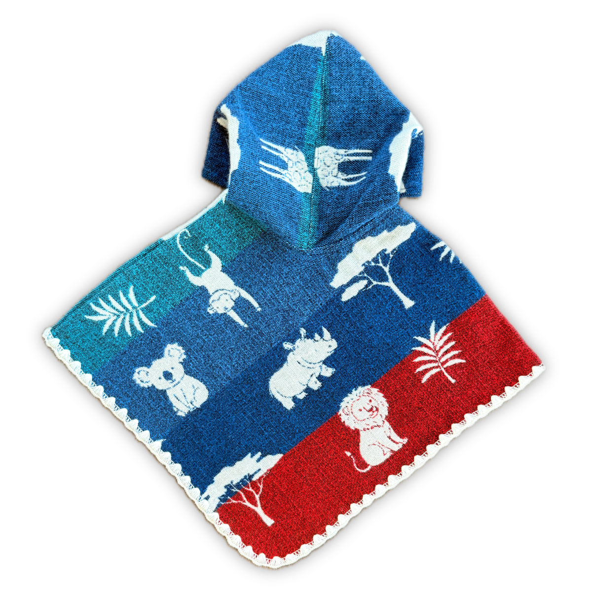 A hooded baby poncho featuring a colorful safari design with blue, teal, and red sections, decorated with white animal and tree motifs, shown on a plain white background.