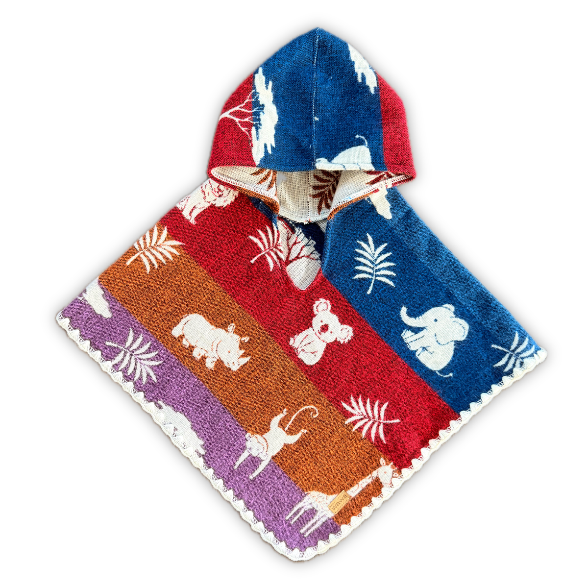 A hooded baby poncho with a colorful striped pattern featuring blue, red, orange, and purple bands, decorated with white animal silhouettes and palm leaf motifs, finished with a white scalloped edge.